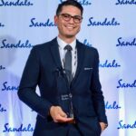 Jonathan Patton receiving the Sandals Chairman's Royal Club Diamond Elite award
