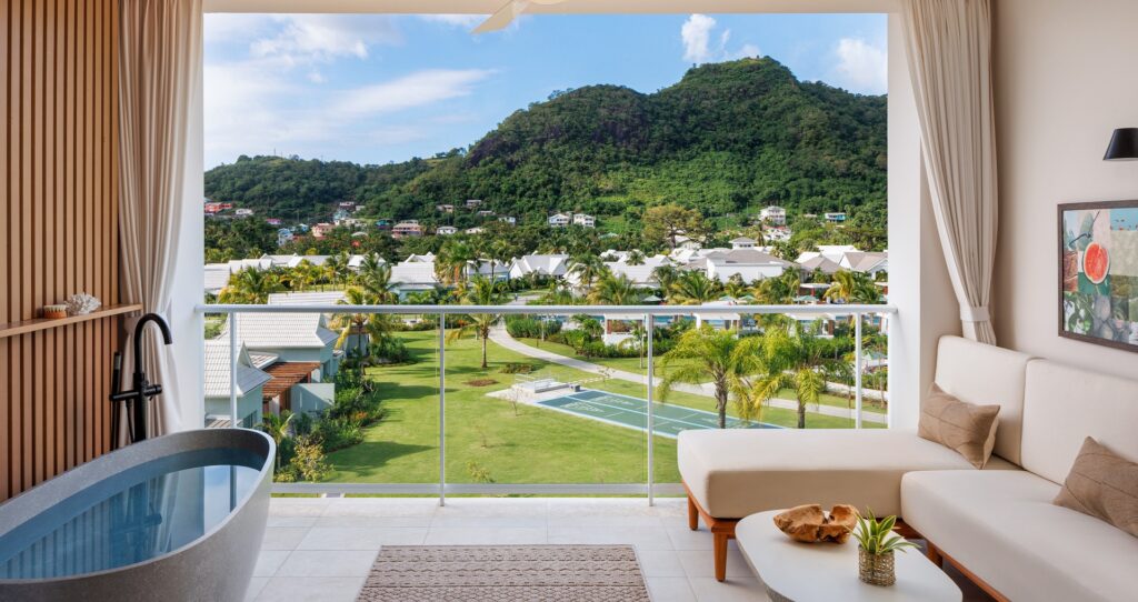 view of Sandals Saint vincent overlooking the pool from the Bamboo Palm Room with Balcony Tranquility Soaking Tub