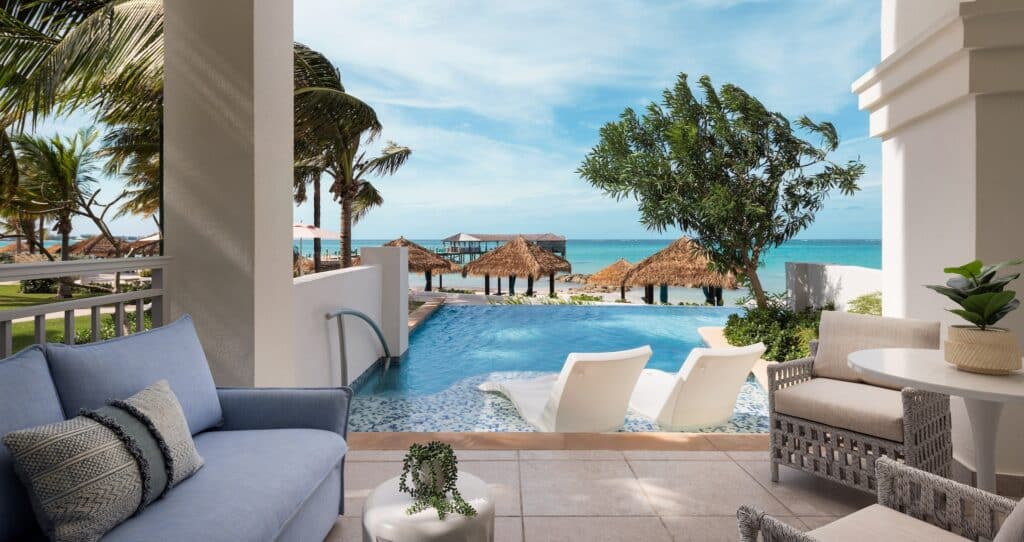 view of a beachfront walkout at Sandals Royal Bahamian
