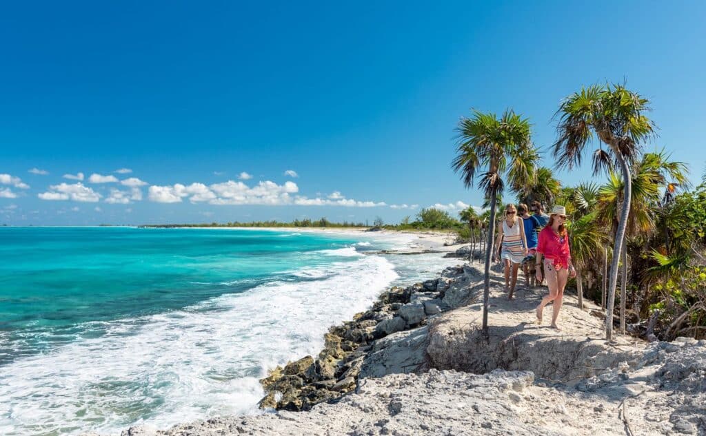 view of people walking on the beach at Sandals Barbados