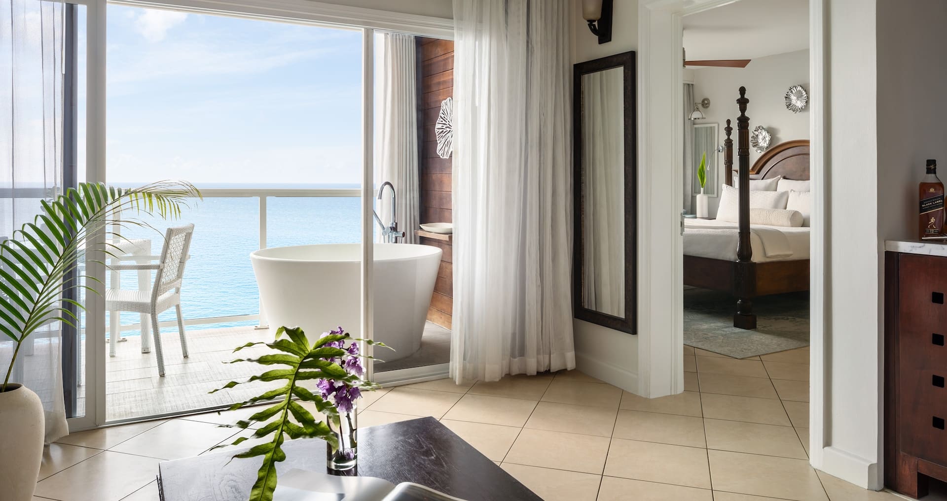 Sunset Bluff Oceanview One Bedroom Butler Suite w/ Balcony Tranquility Soaking Tub at Sandals Regency La Toc