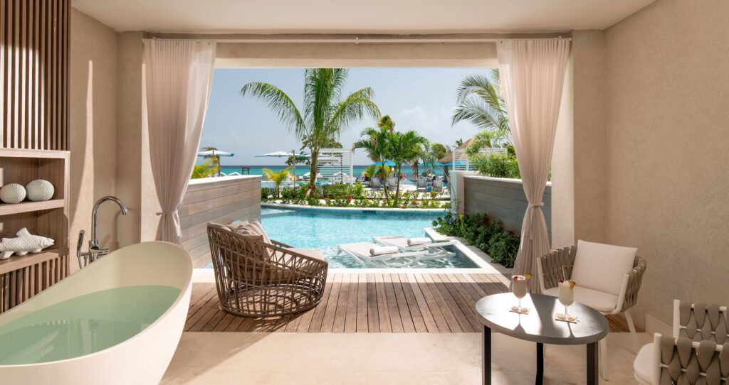 Tufa Terrace Swim-up One Bedroom Suite with Tranquility Soaking Tub and butler service at Sandals Dunns River
